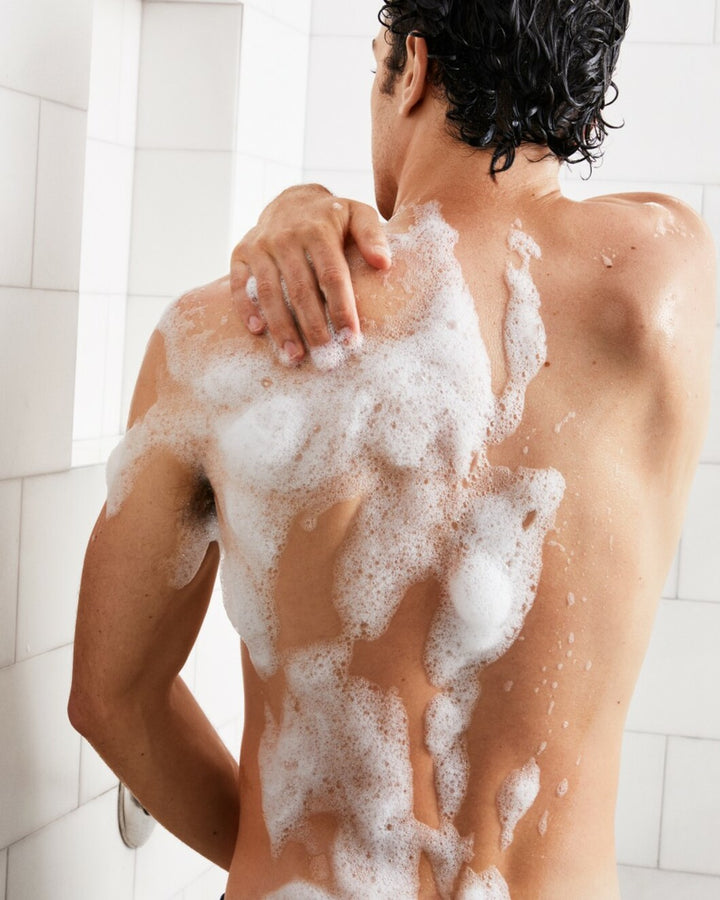 man washing his body