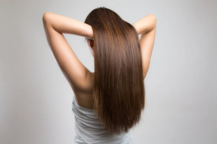 backview of lady with long brown hair