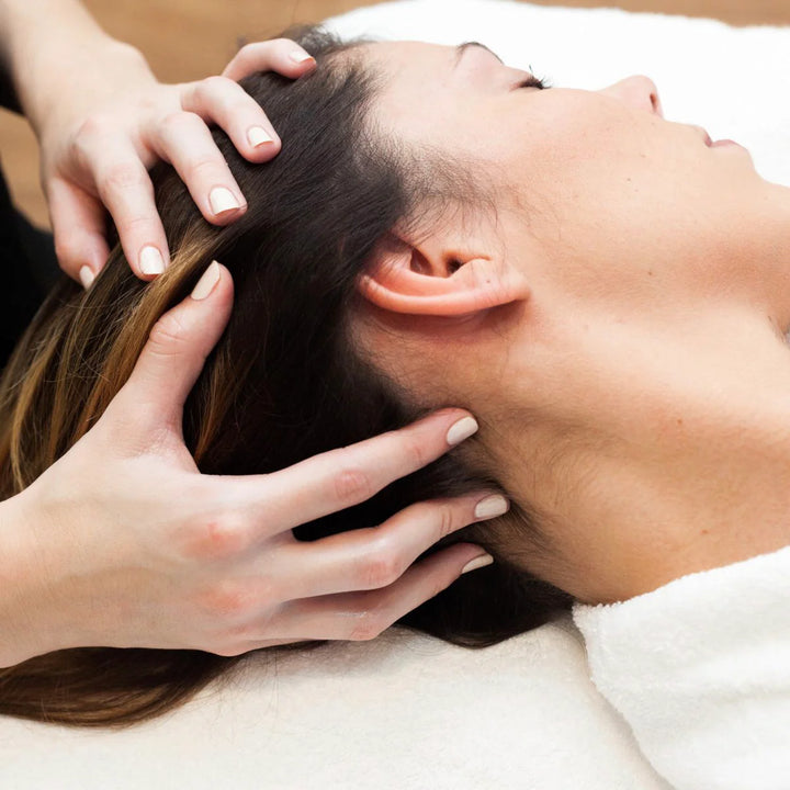 lady getting a scalp massage