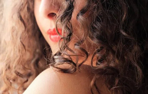 close up lady wth curly hair