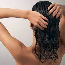 lady touching her wet hair