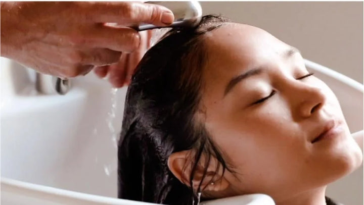 lady getting her hair washed